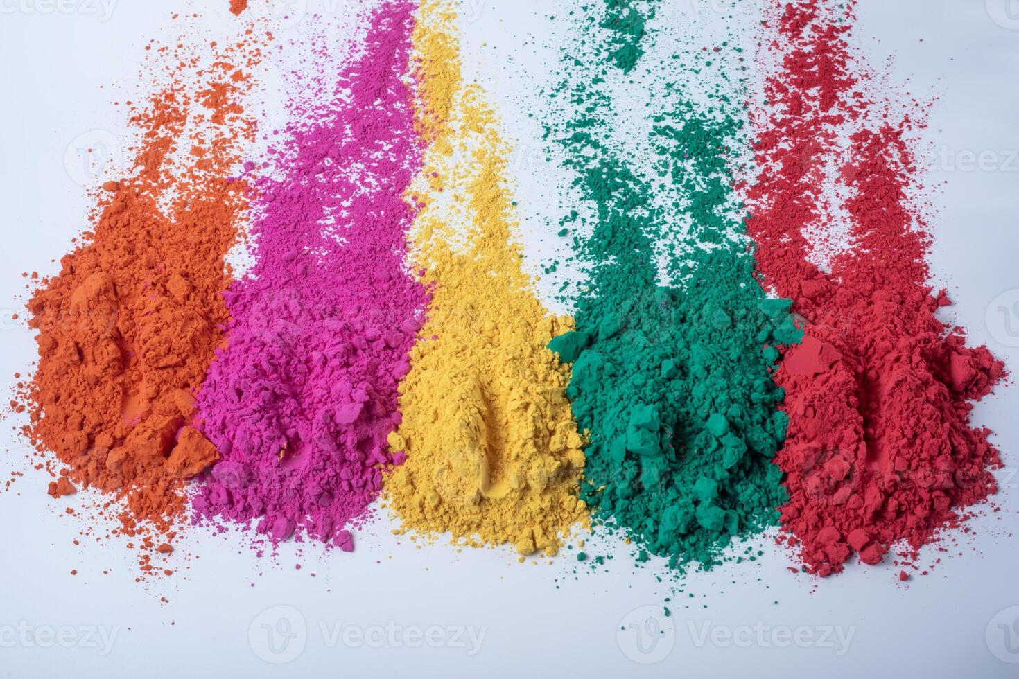 Multicolored holi powder isolated on white background. Indian festival Holi. photo