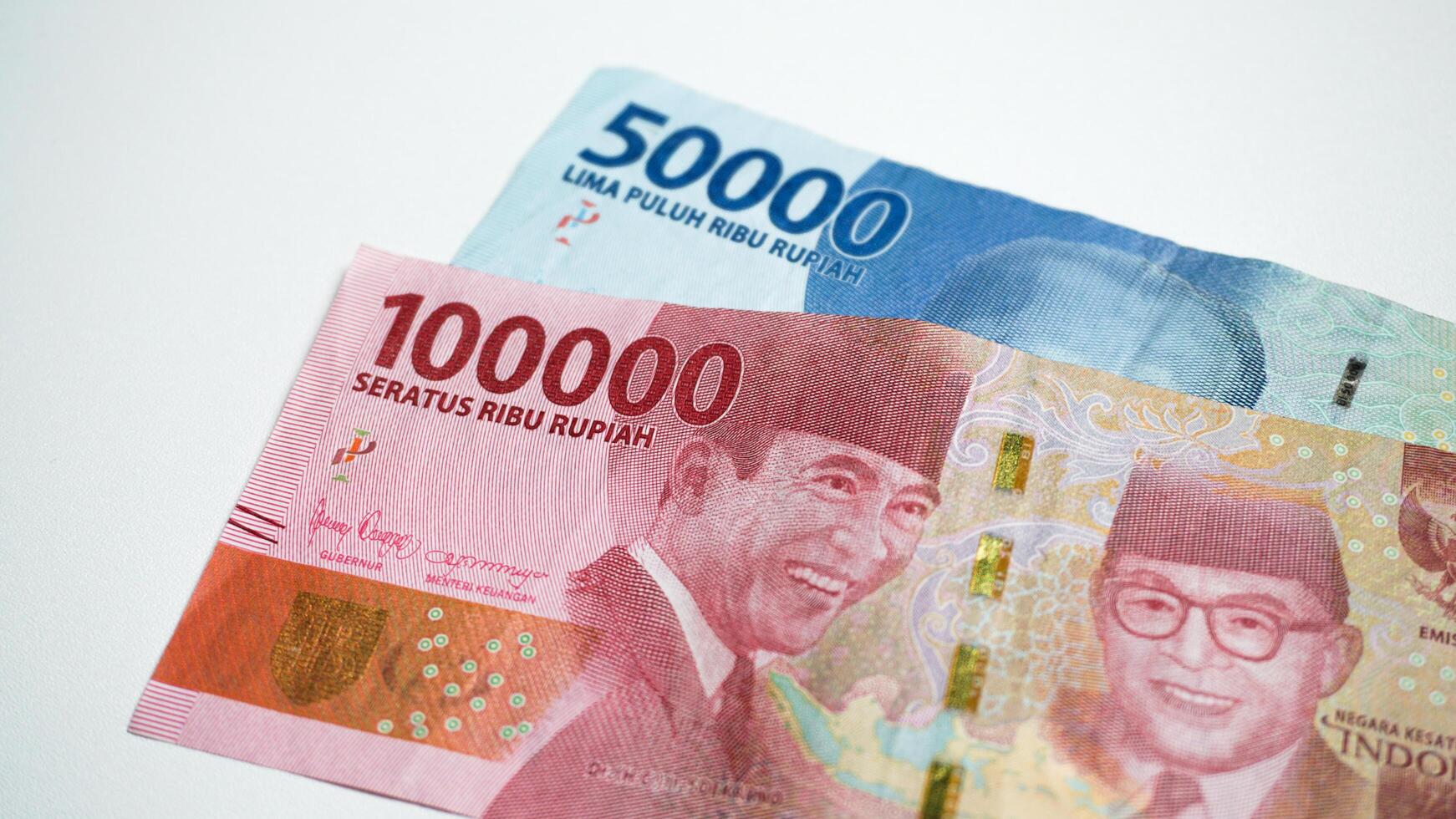 Rupiah currency on white background. photo