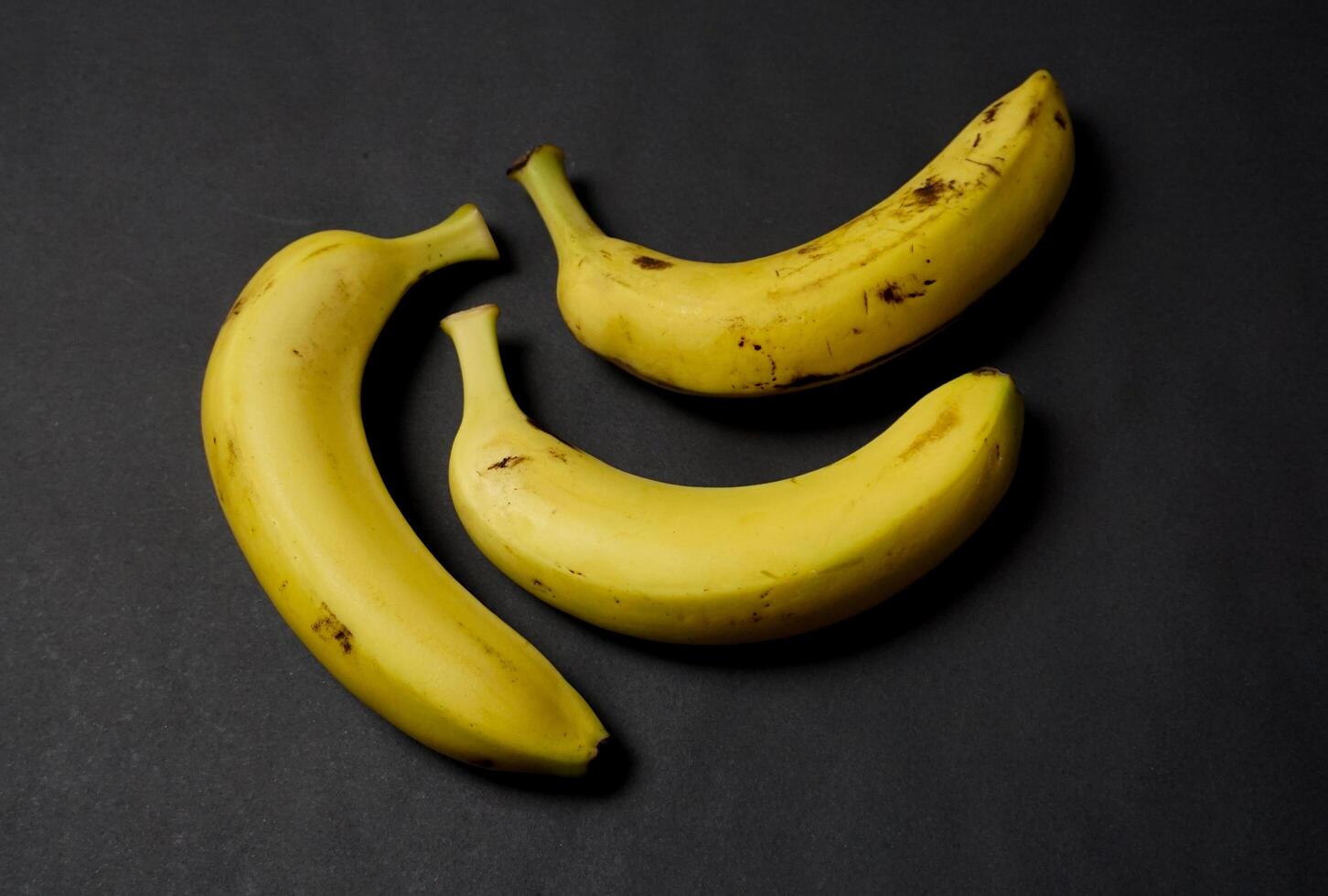 Banana fruit on black background. photo