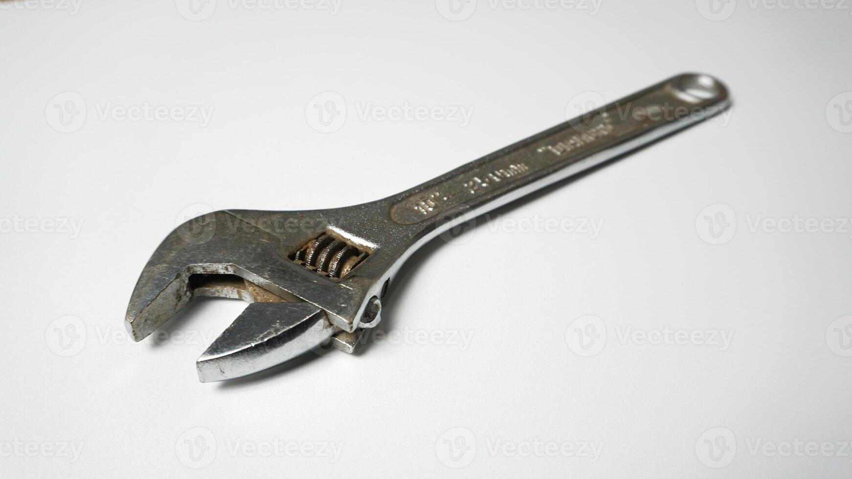 Adjustable wrench on a white background. photo