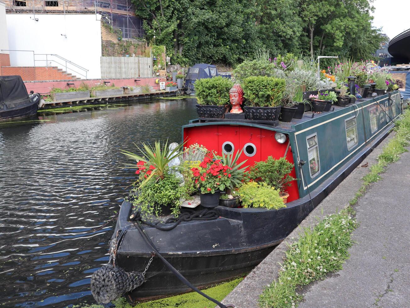 London canal living house boat on the water photo