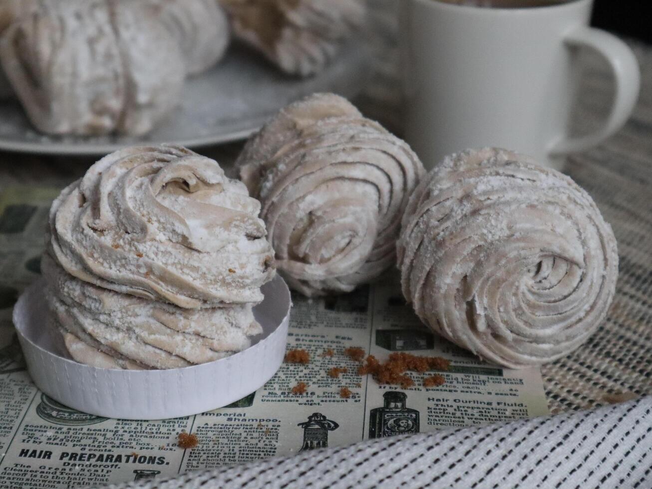 Handmade vanilla marshmallows. Sweet zephyr and brown sugar photo
