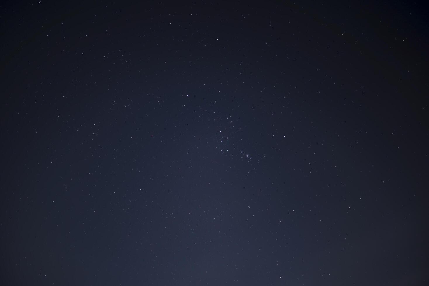 The dark night sky with many stars photo