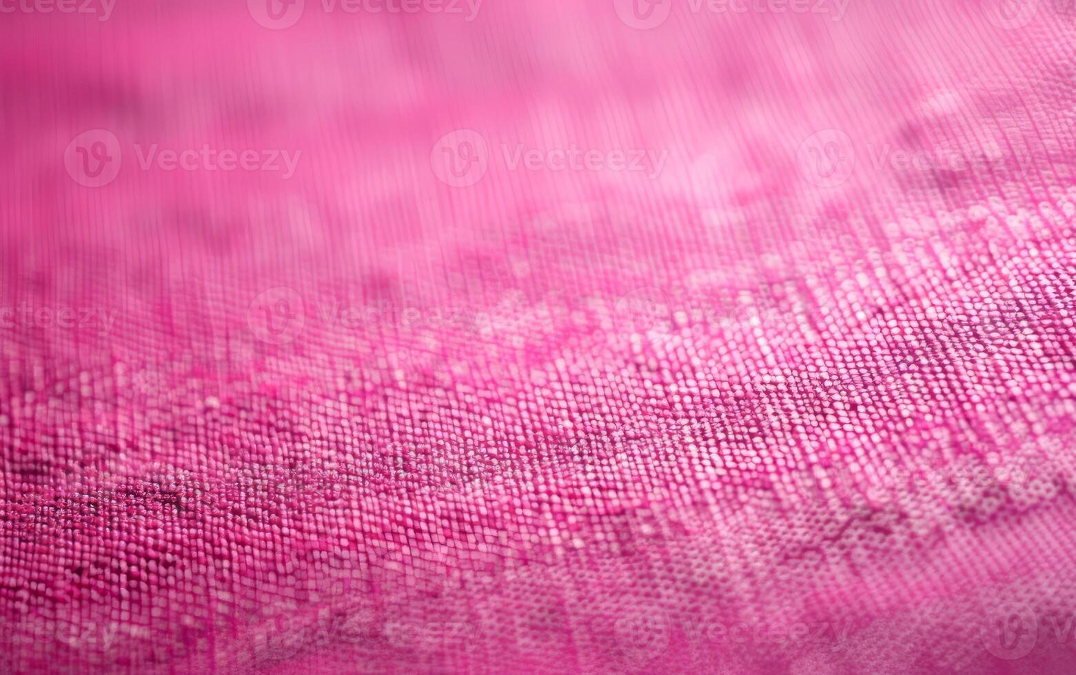 A close up of a pink fabric with a blurry background photo