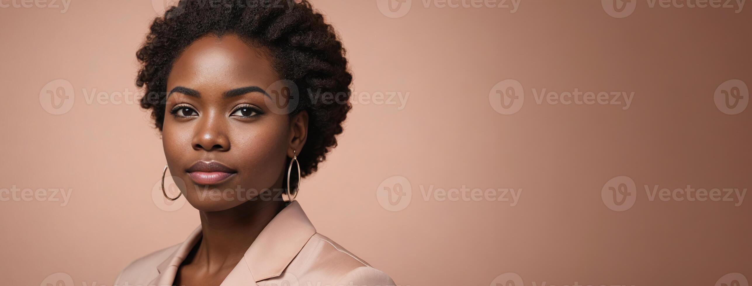 African American 2530 Years Woman Isolated On A Peach Background With Copy Space. photo