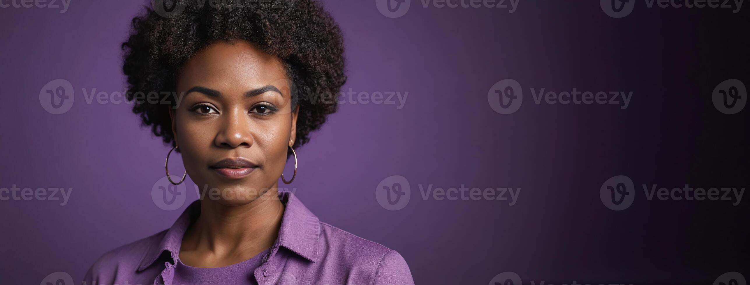 A 50S Adult African American Woman Isolated On A Purple Background With Copy Space. photo