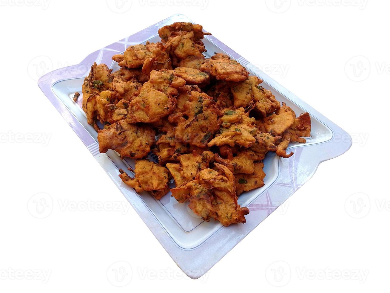 un plato lleno con crujiente y sabroso pakora - calle comida foto