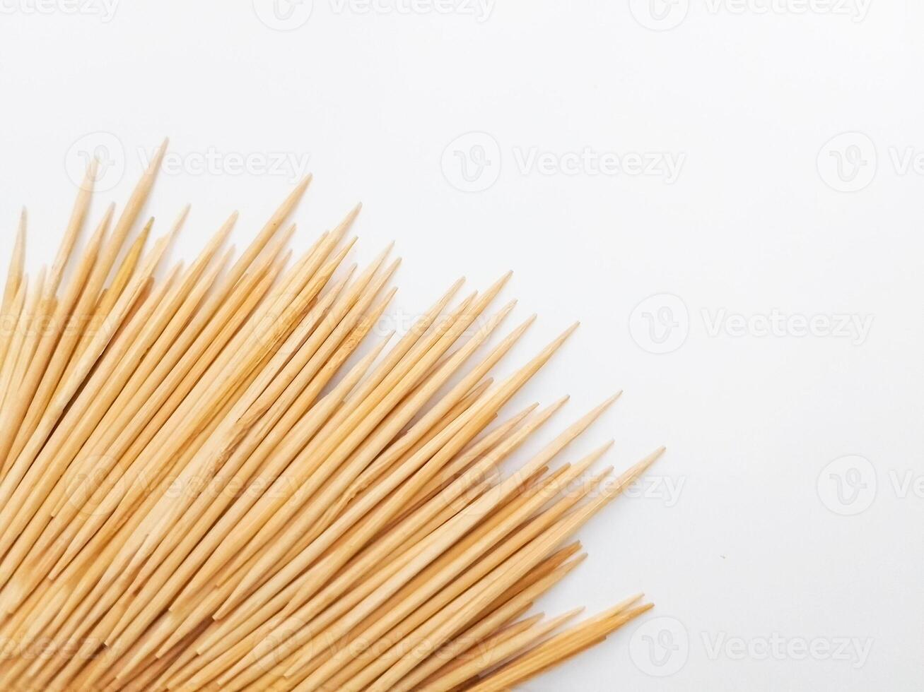 Bundle of Wooden Toothpicks isolated on white background photo