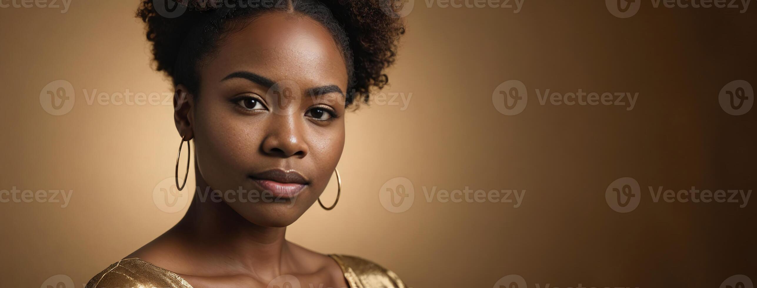 African American Ethnicity 30S Woman Isolated On A Gold Background With Copy Space. photo