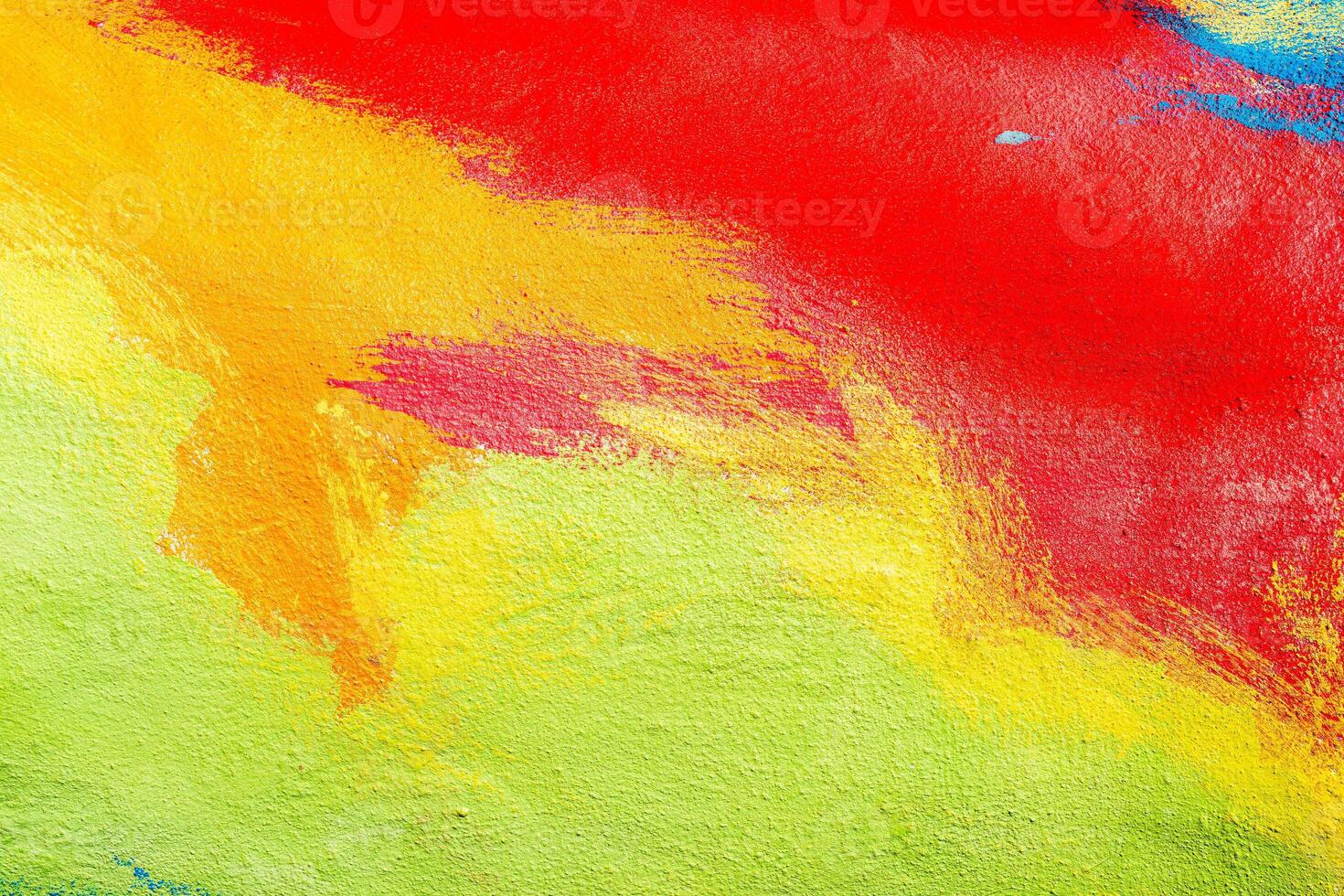 A fragment of colorful graffiti painted on a wall. Abstract urban background. Spray painting art. photo
