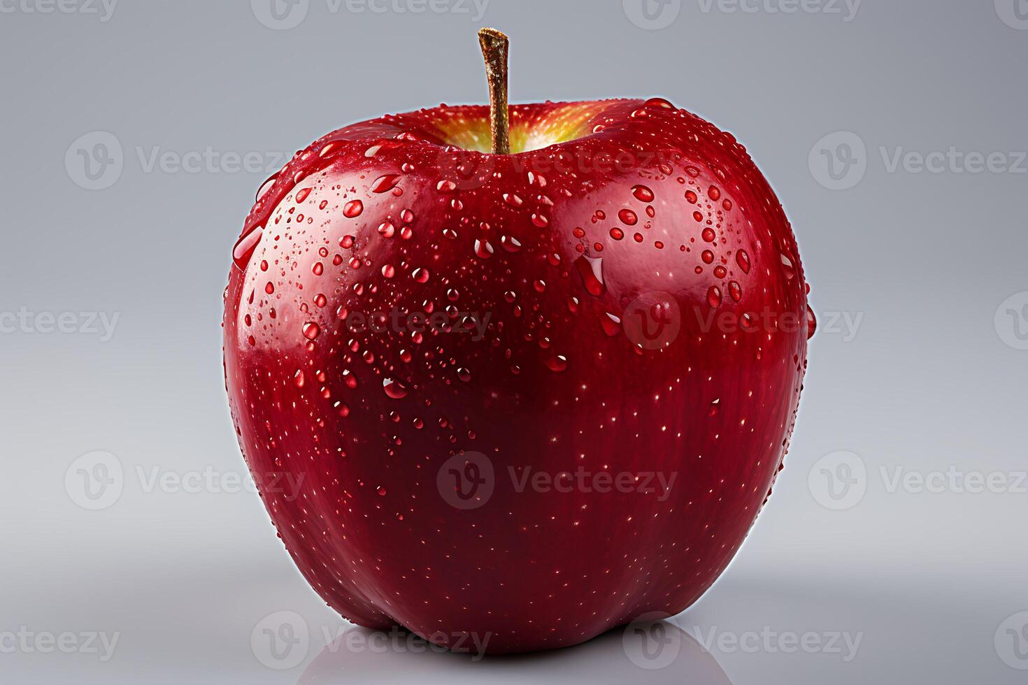 Red apple with water drops on white background photo