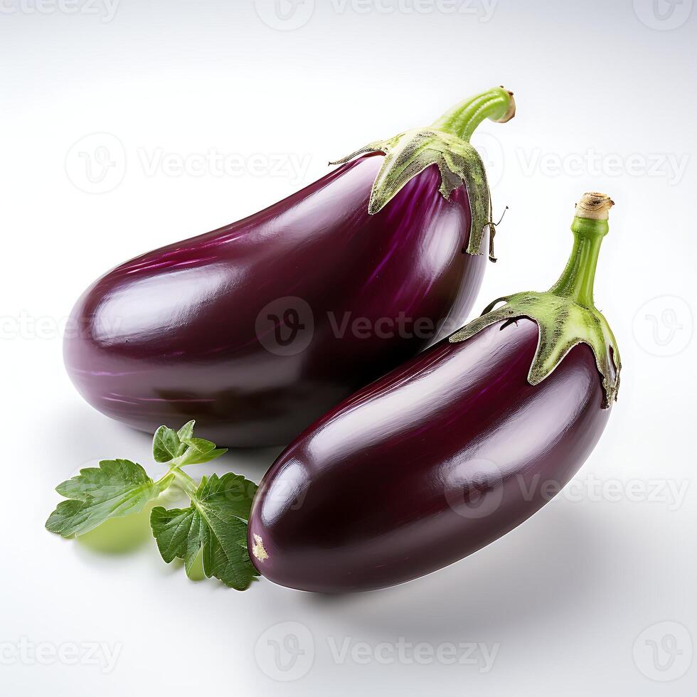 Two eggplant and basil on white background. Clipping path included photo