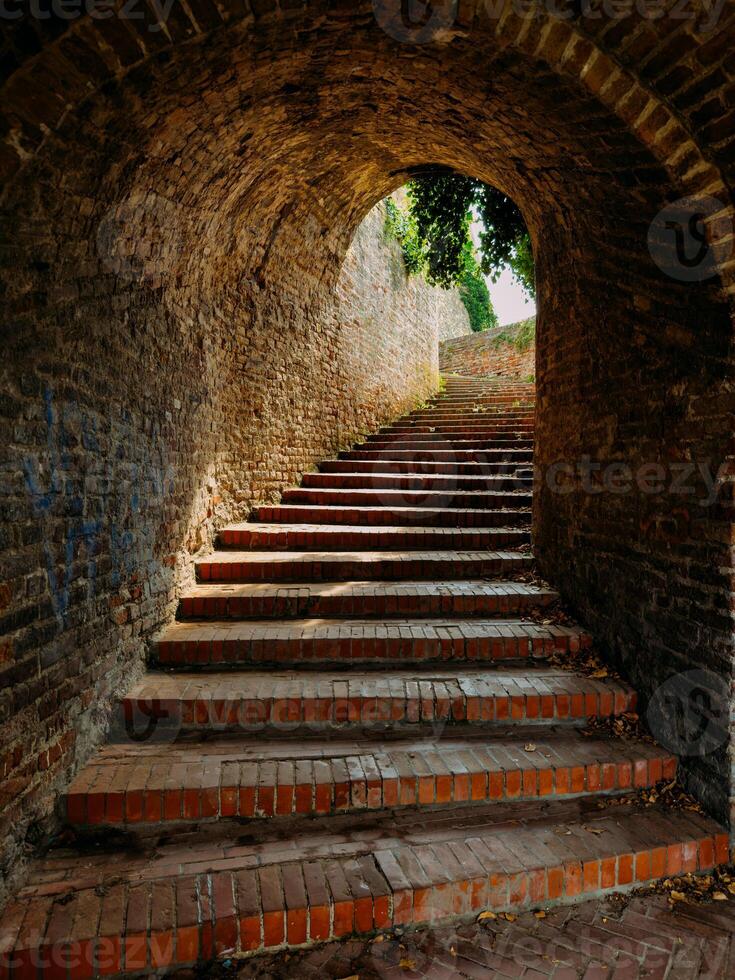 Stairs in the tunnel leading to the Petrovaradin Fortress, Novi Sad, Serbia photo