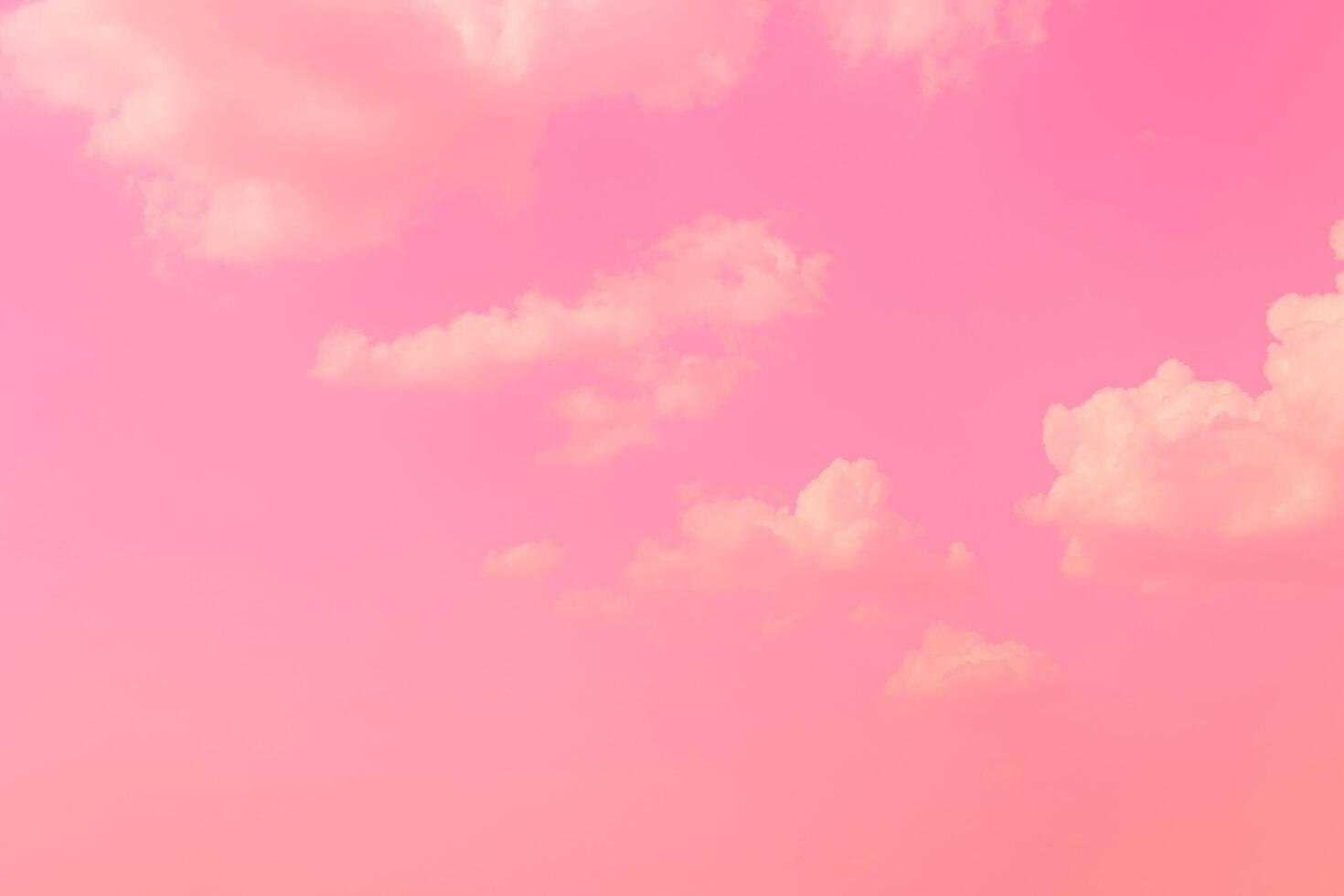 Pink sky clouds background, pastel sky background photo
