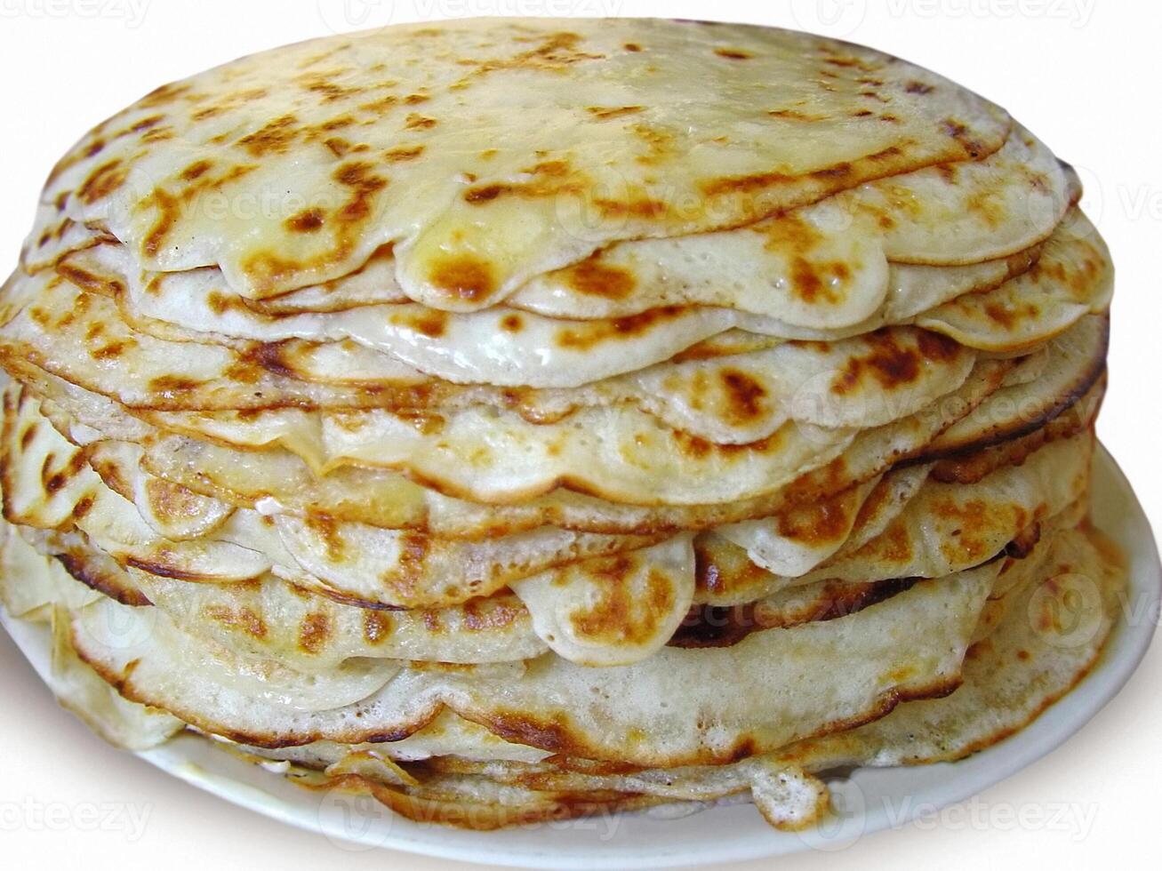 Stack of pancakes on white background photo