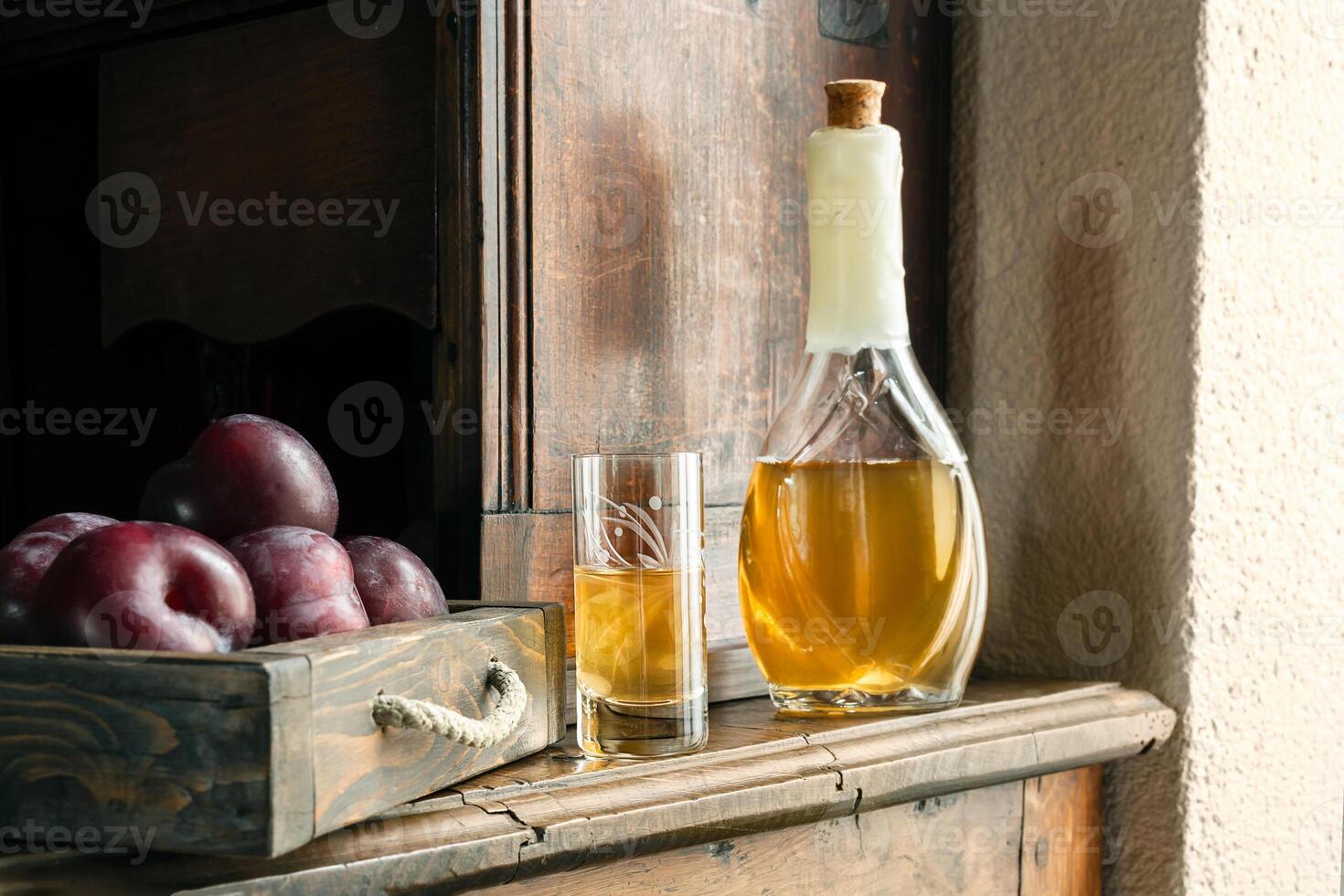 Traditional Balkan plum brandy - slivovica photo