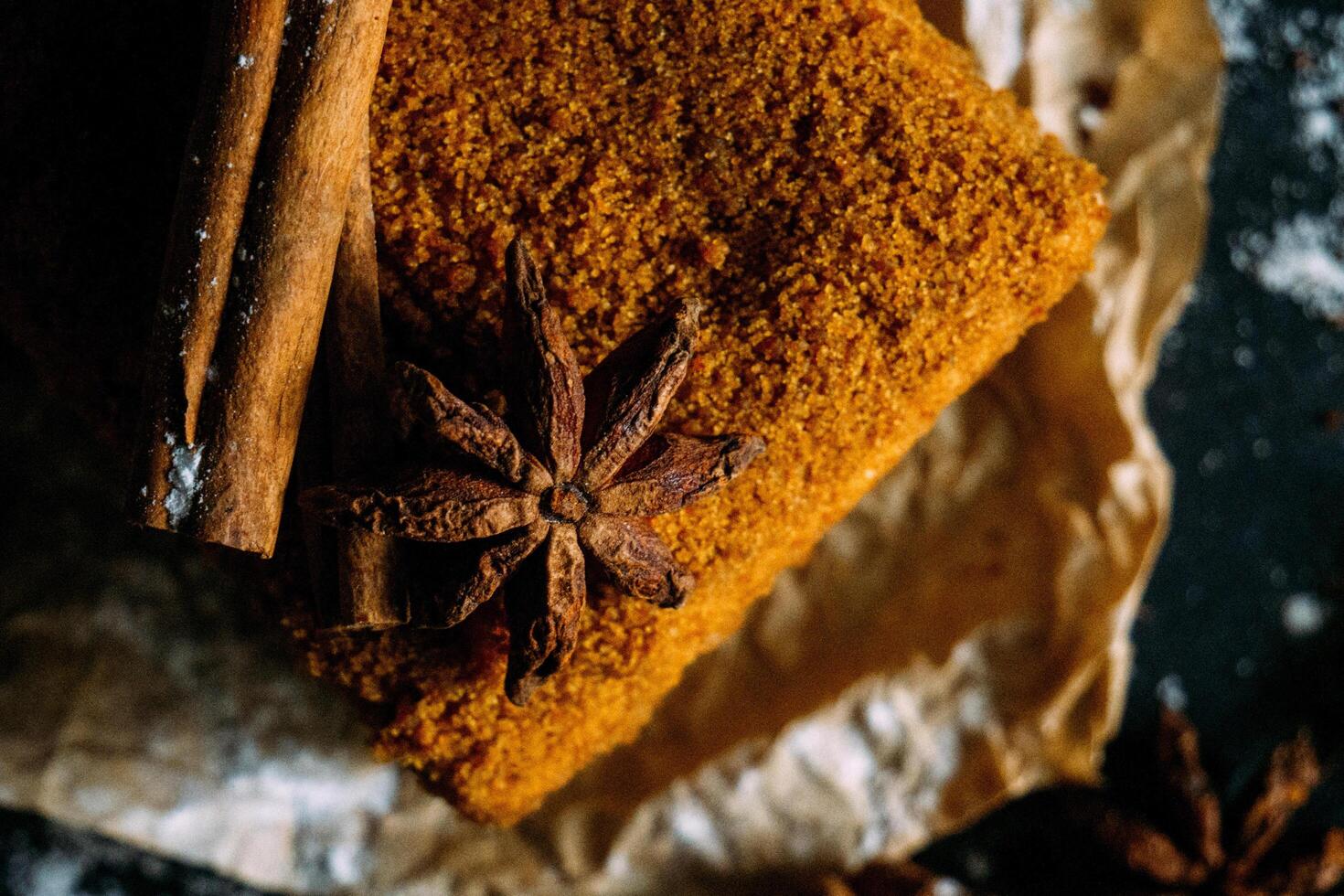 a cake with cinnamon and star anise on top photo