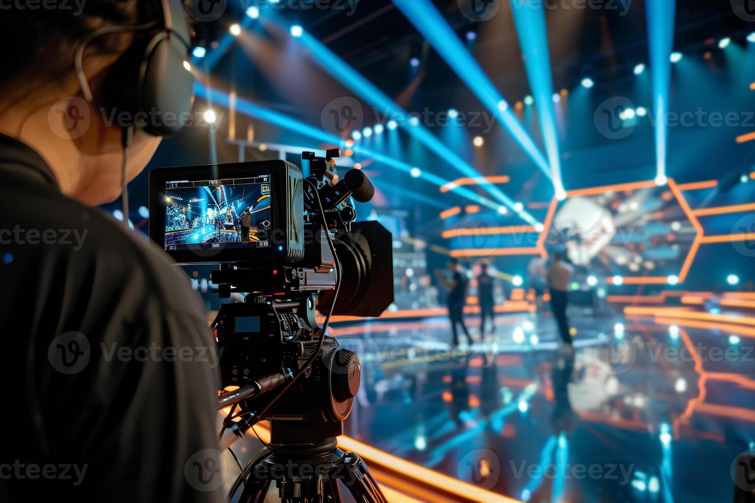 The cameraman is filming an entertainment show on the set. photo