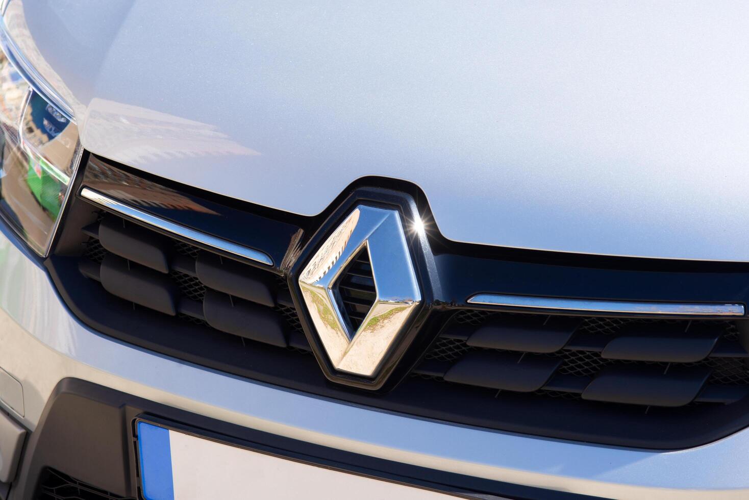 Kyiv, Ukraine - April 4, 2024. A photo of a light Renault car logo emblem close up.
