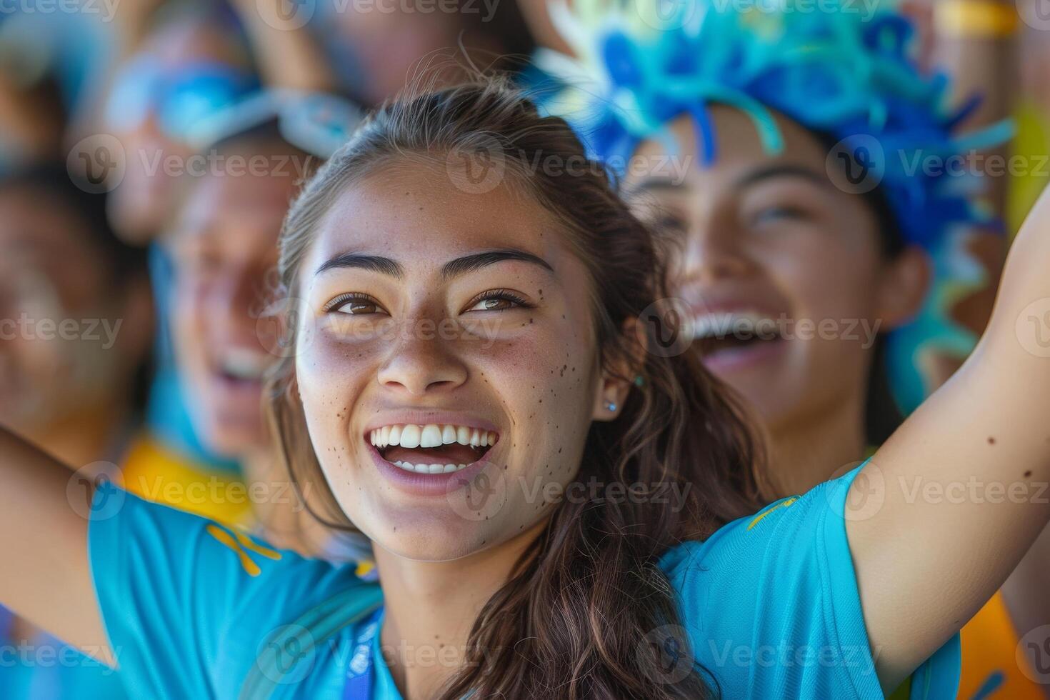 A group of sport fans cheering a sport match photo