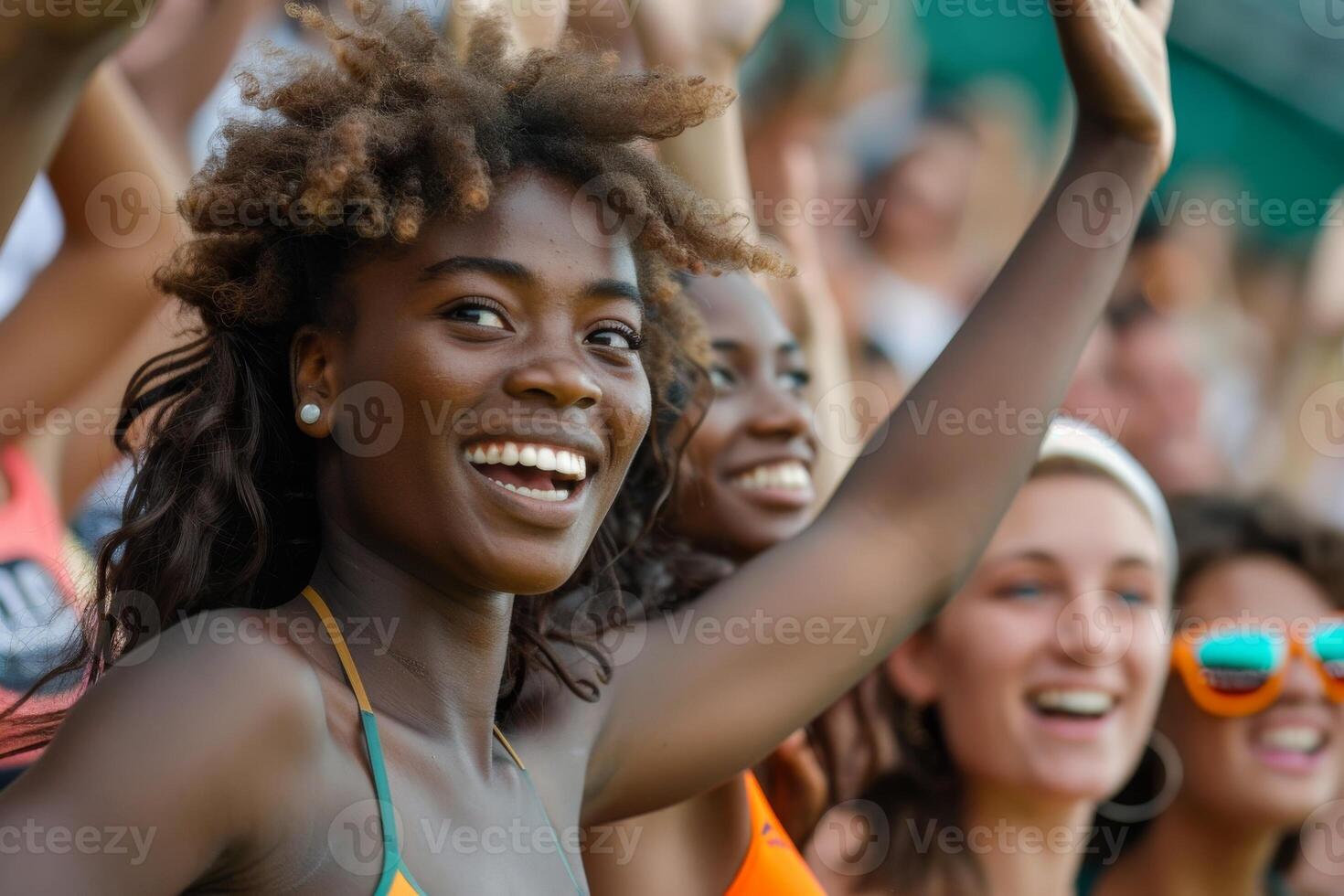 A group of sport fans cheering a sport match photo