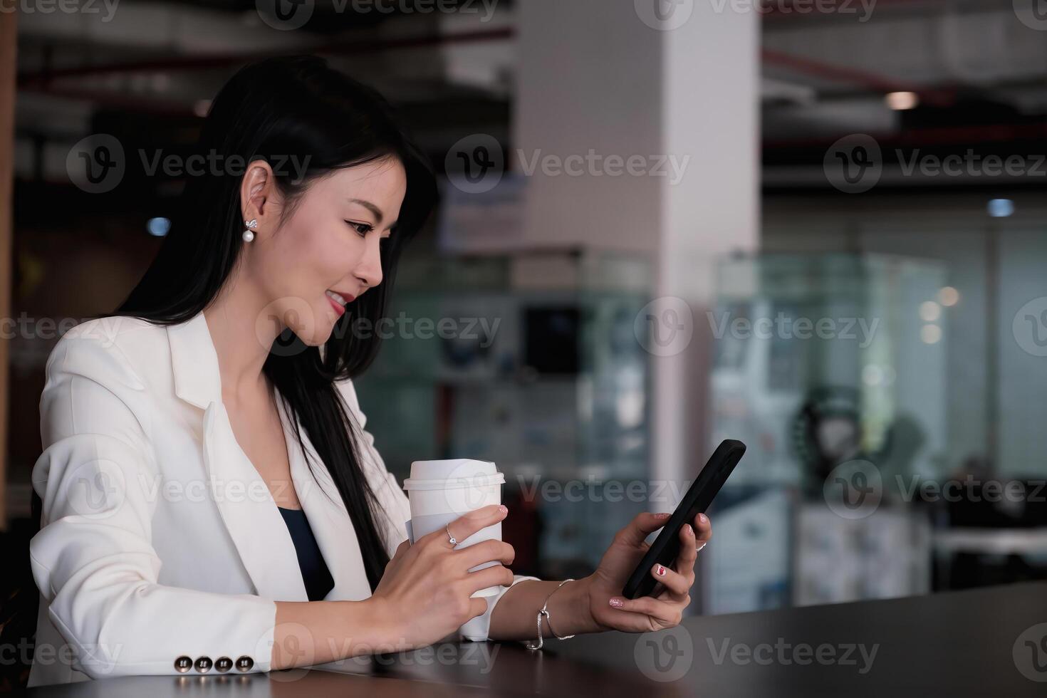 A businesswoman completes KYC using an online banking program in order to open a digital savings account. The definition of cyber security photo