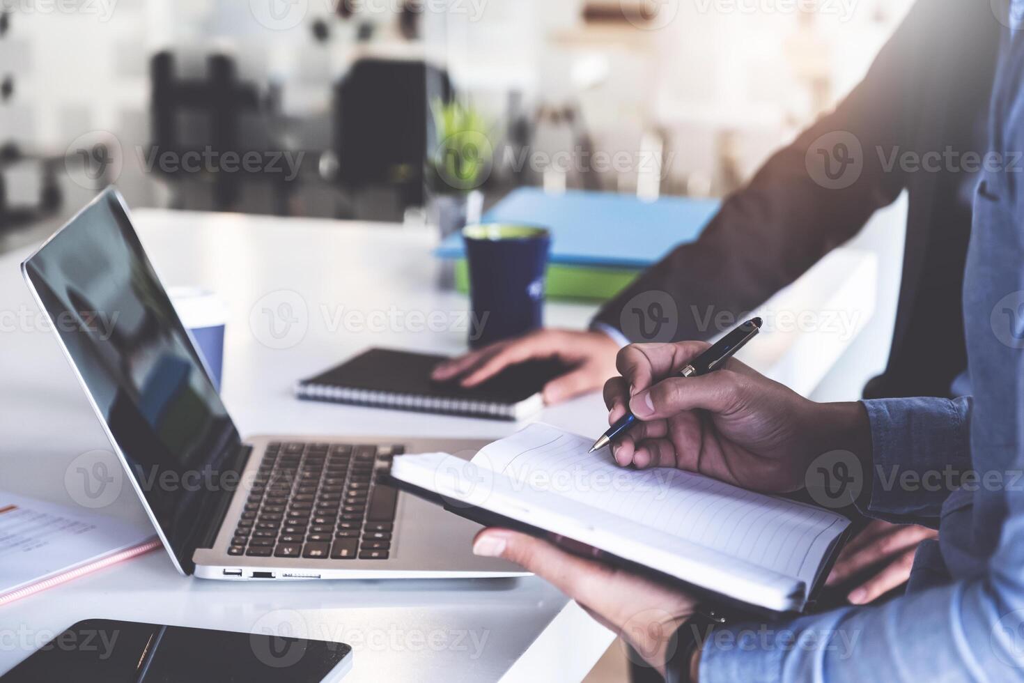 Group of Businessman and Accountant checking data document on digital tablet for investigation of corruption account . Anti Bribery concept. photo