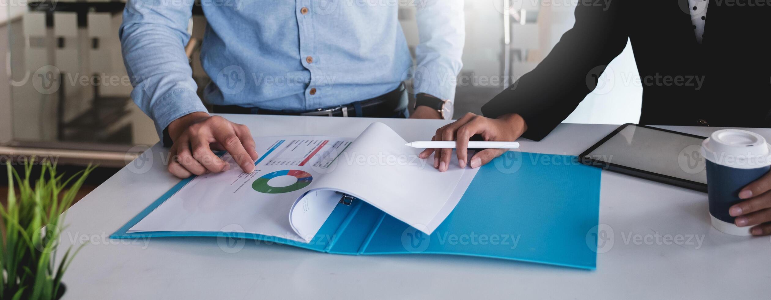 Group of Businessman and Accountant checking data document on digital tablet for investigation of corruption account . Anti Bribery concept. photo