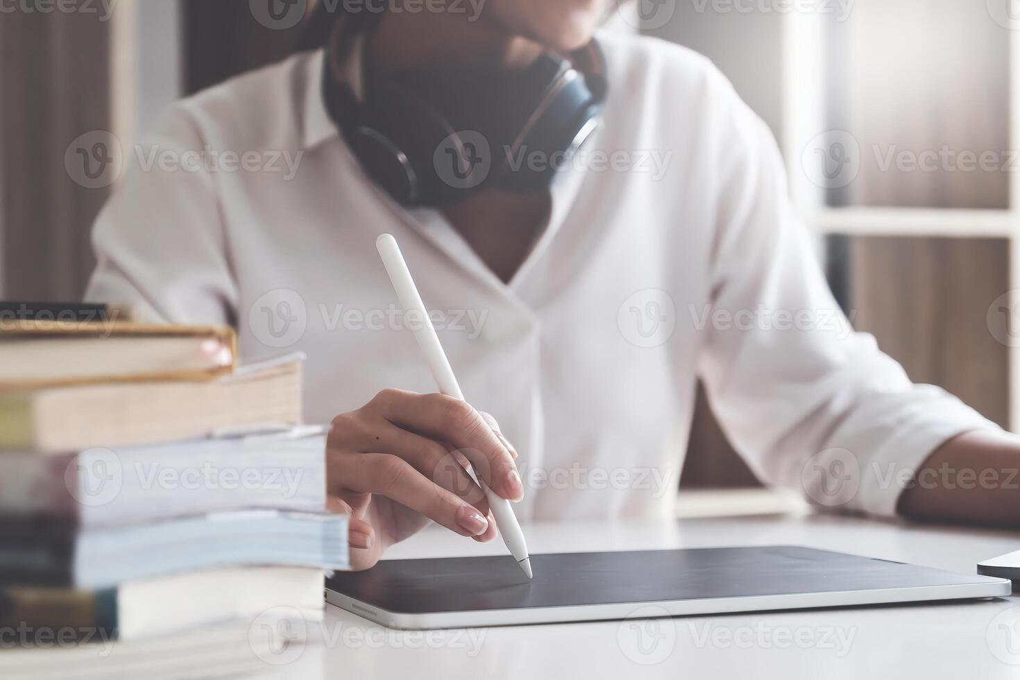 Jouful of creative female designer making a sketch in digital tablet. Creative occupation. Business and career. UX UI design. Web design. photo