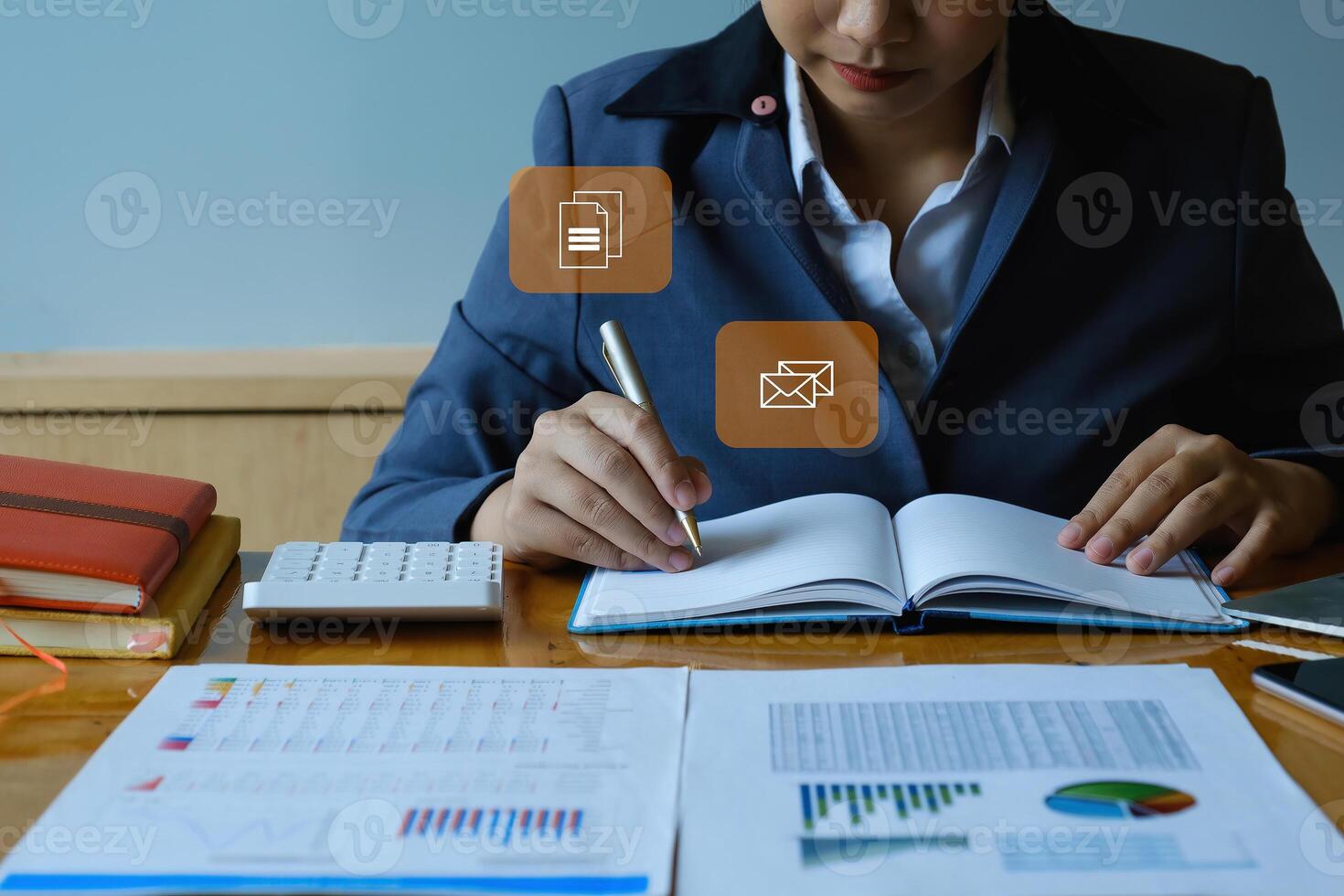 Close up of business woman busy calculating finances or taxes on calculator with icon on virtual screen. Work From Home concept. photo