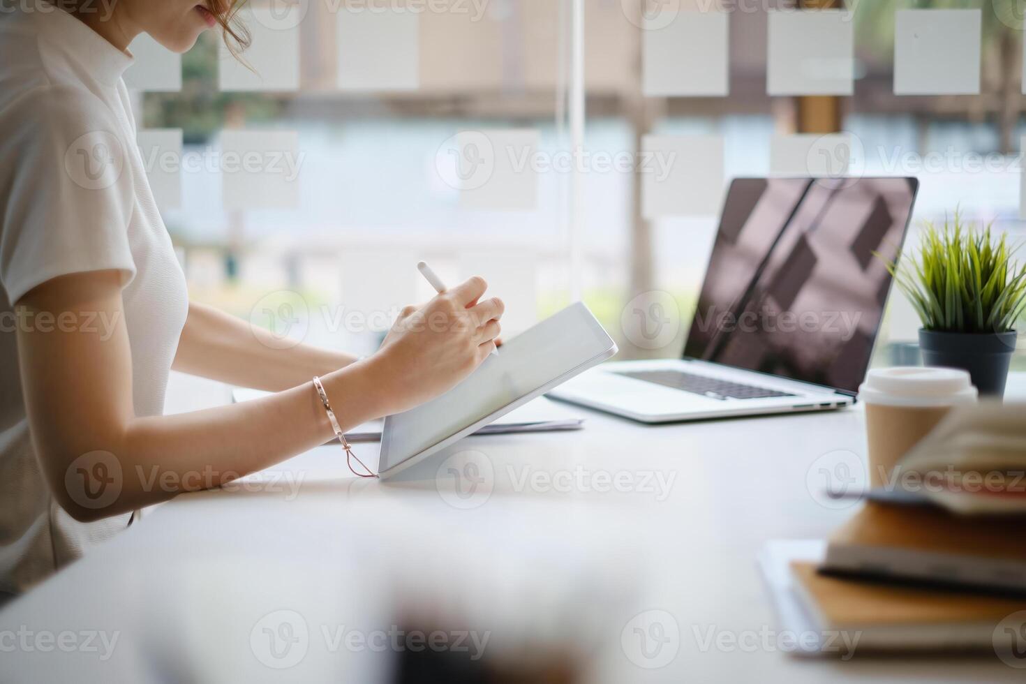 User experience concept. Creative Web Designer sketching application and developing template layout on laptop, framework for digital devices. photo