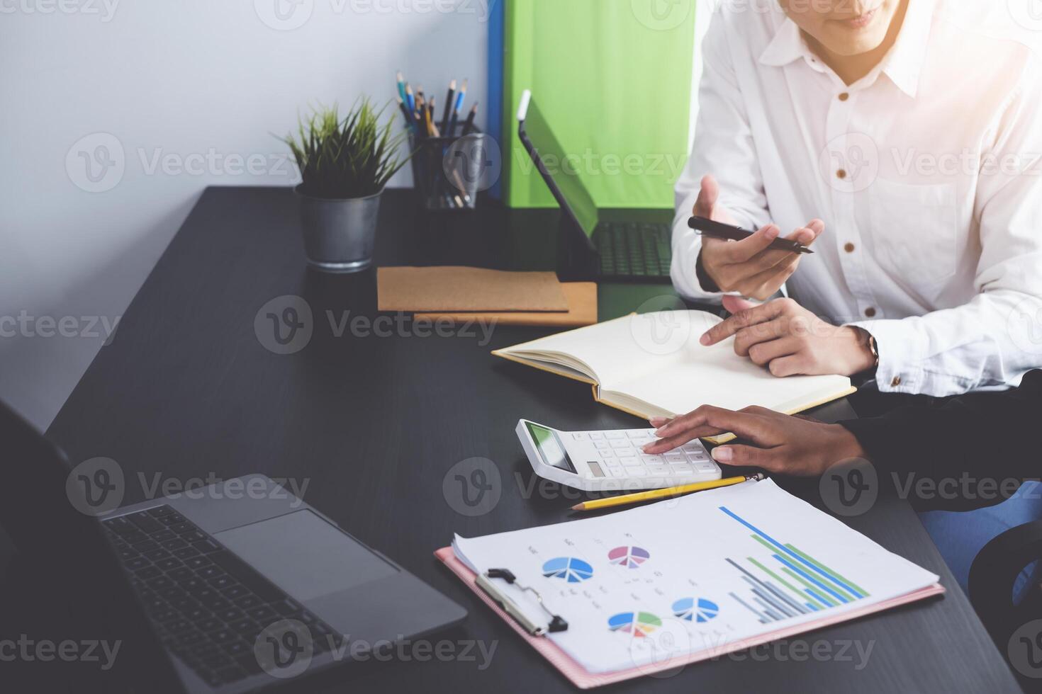 Group of Businesswoman and Accountant checking data in paperwork file for investigation of corruption account . Anti Bribery concept. photo