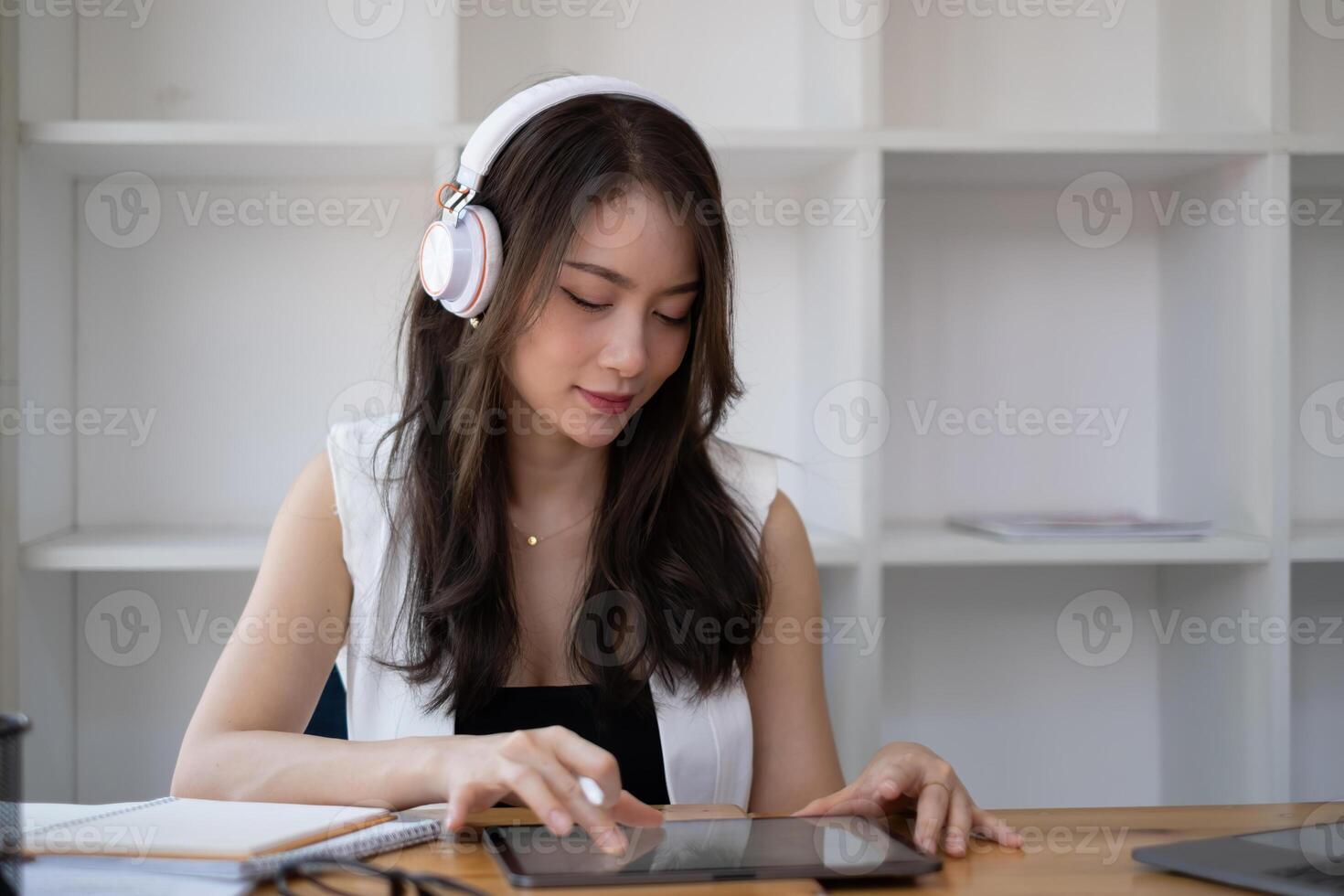 Closeup of female ux developer and ui designer about mobile phone app interface in living room at home.Creative digital development agency concept. photo