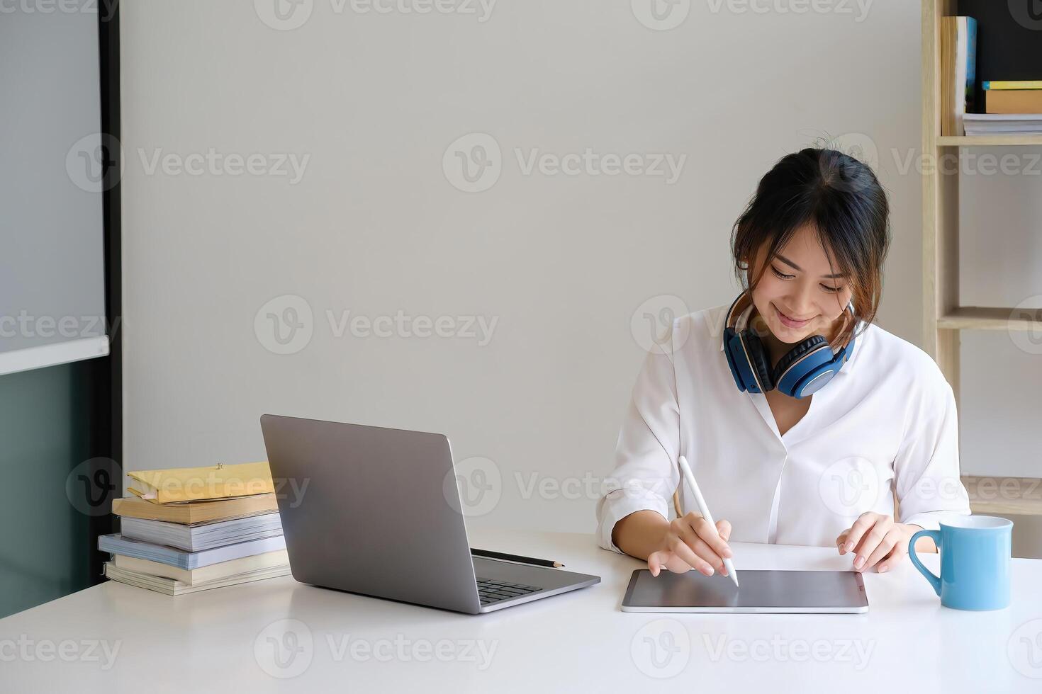 A girl practice basic course exercises by on laptop before online class. Social distancing.stay home. New normal. Covid-19 coronavirus concept photo