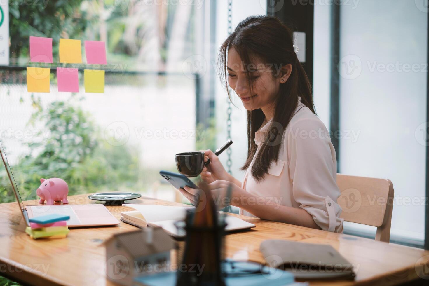 A business woman completes KYC using an online banking program in order to open a digital savings account. The definition of cyber security. photo