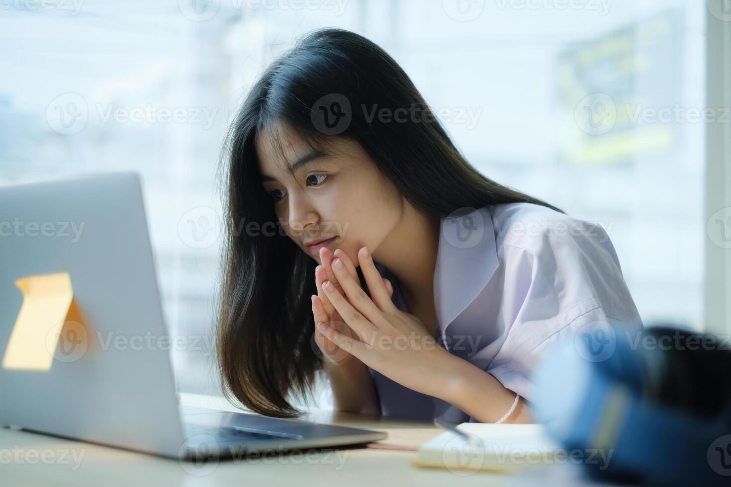 E-learning ,online ,education and internet social distancing protect from COVID-19 viruses concept. Asian woman student conference e-learning with teacher on laptop computer at home. photo