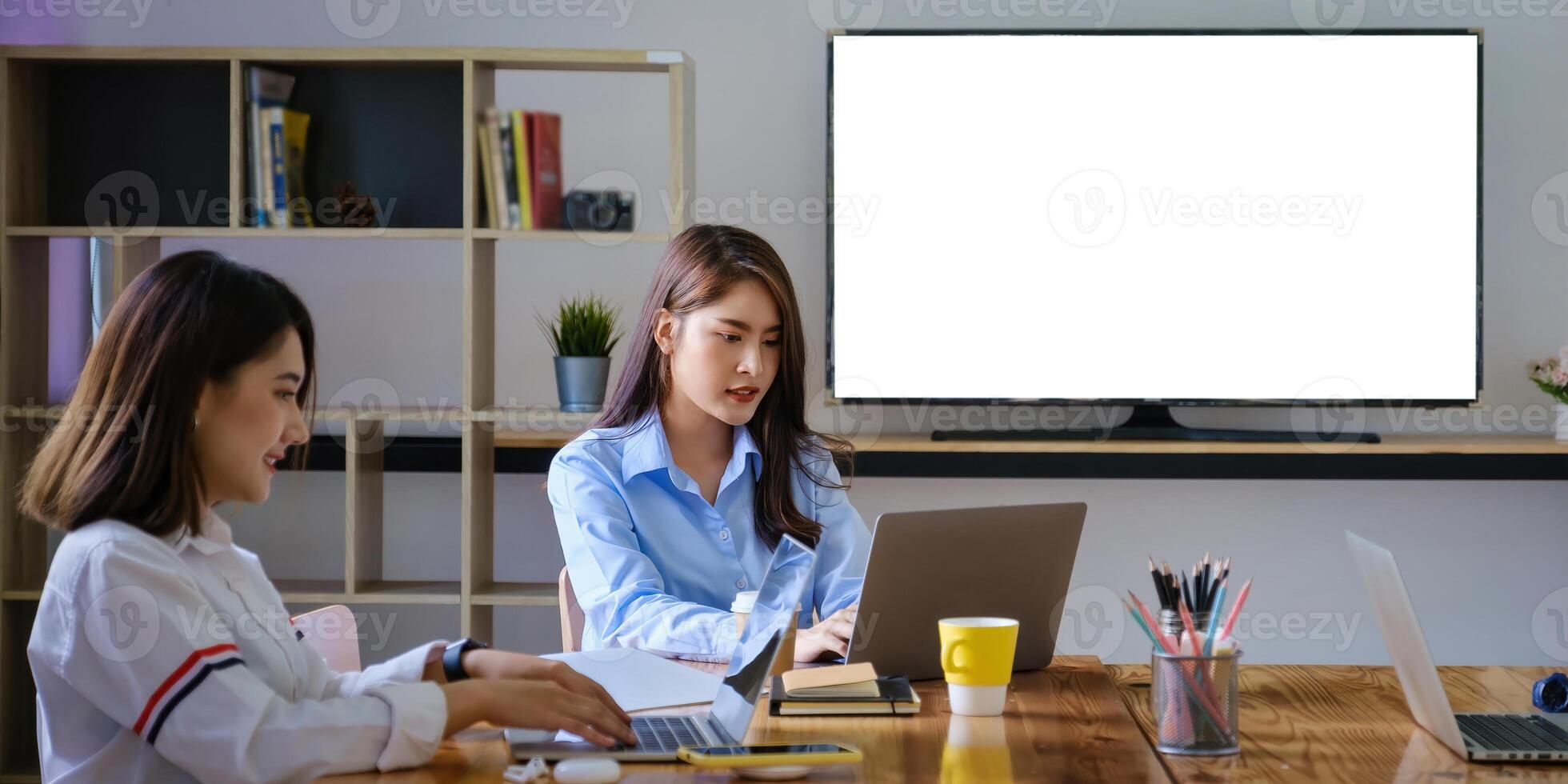 Group of Businesswoman and Accountant checking data document on laptop for investigation of corruption account . Anti Bribery concept. photo