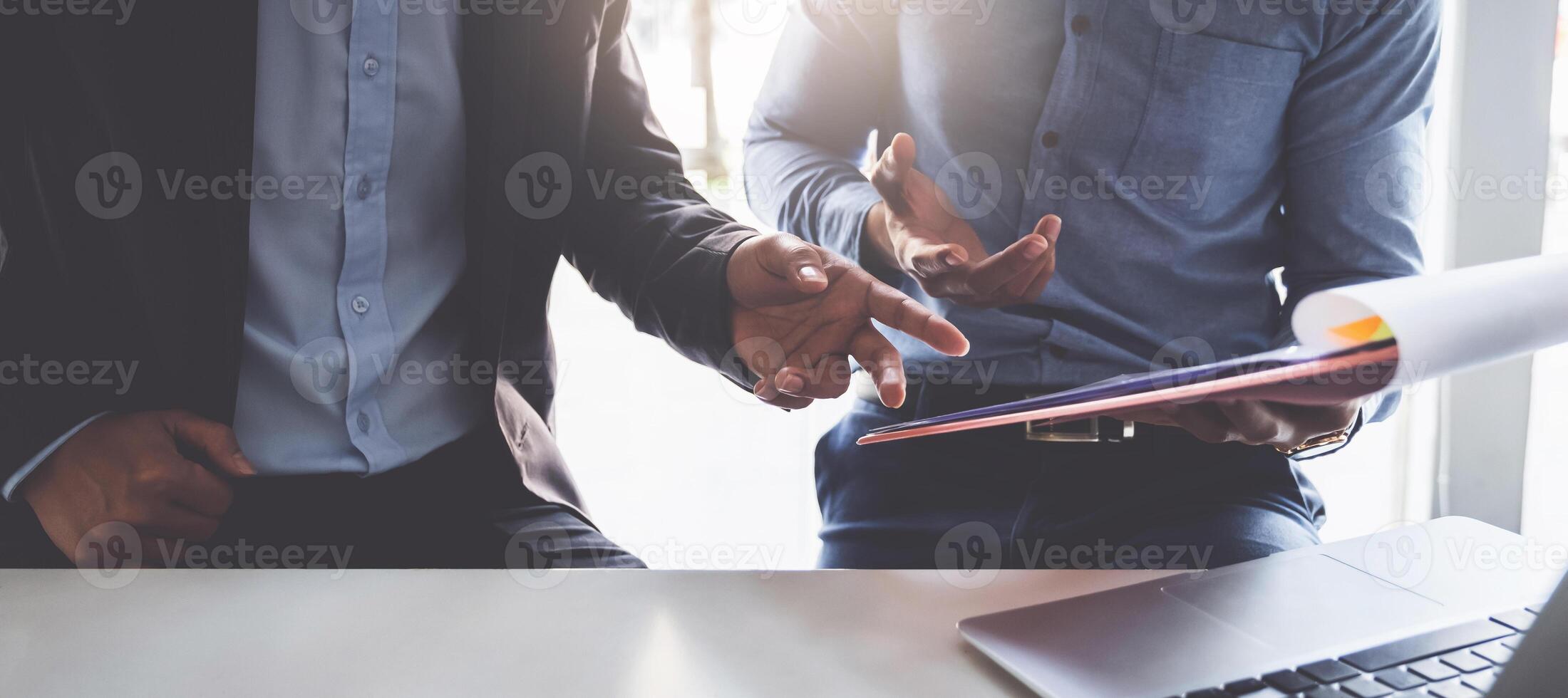Group of Businessman and Accountant checking data document on digital tablet for investigation of corruption account . Anti Bribery concept. photo