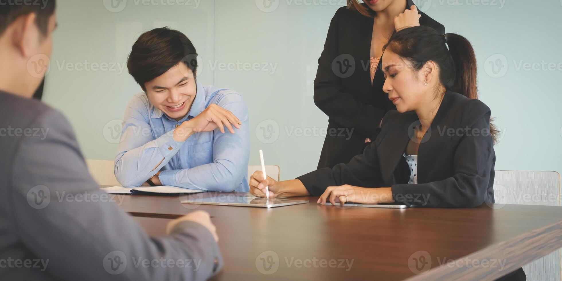Group of Businessman and Accountant checking data document on digital tablet for investigation of corruption account . Anti Bribery concept. photo