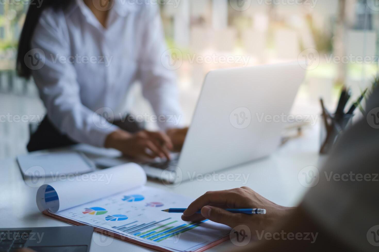 Group of Businessman and Accountant checking data document on digital tablet for investigation of corruption account . Anti Bribery concept. photo