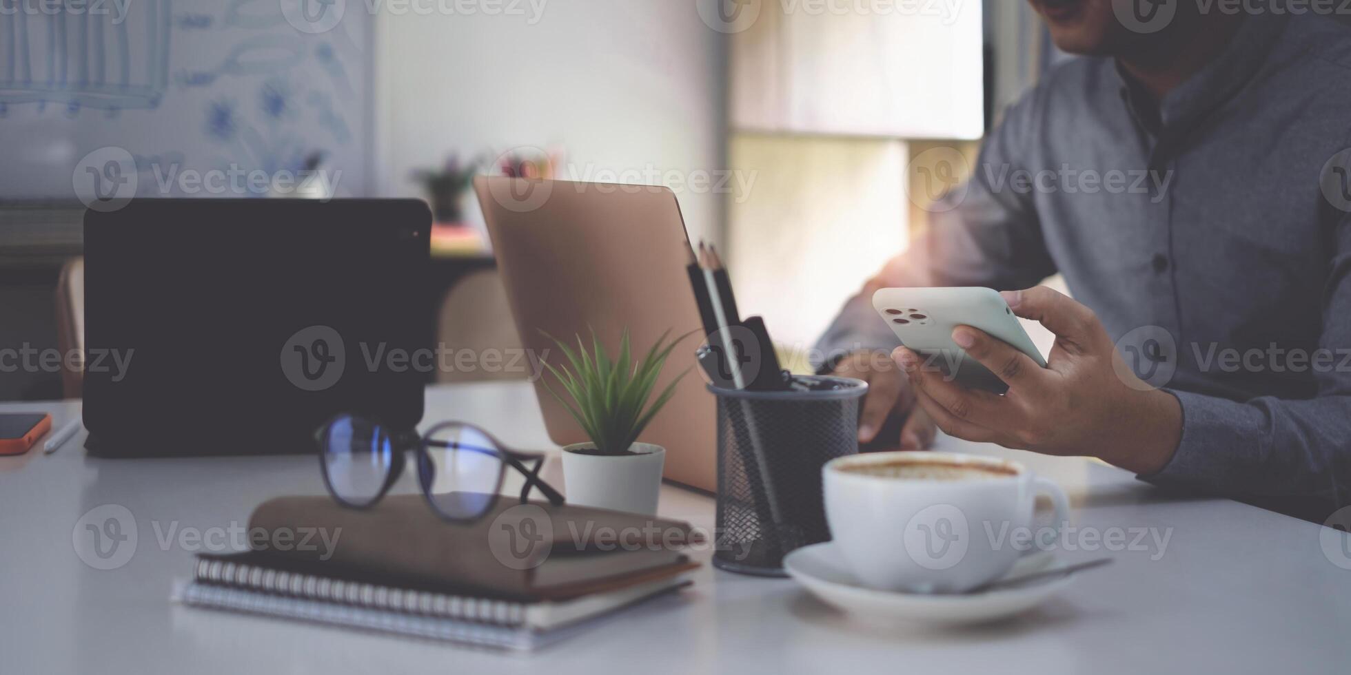 A business man completes KYC using an online banking program in order to open a digital savings account. The definition of cyber security. photo