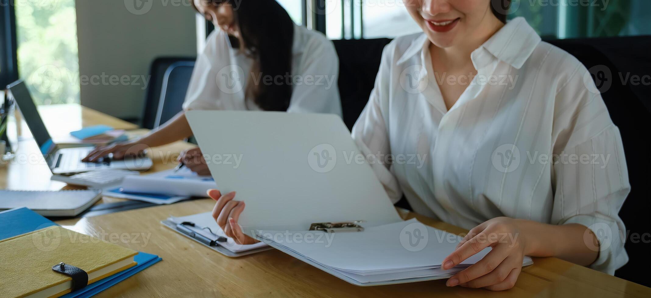 Group of Businessman and Accountant checking data document on digital tablet for investigation of corruption account. Anti Bribery concept. photo