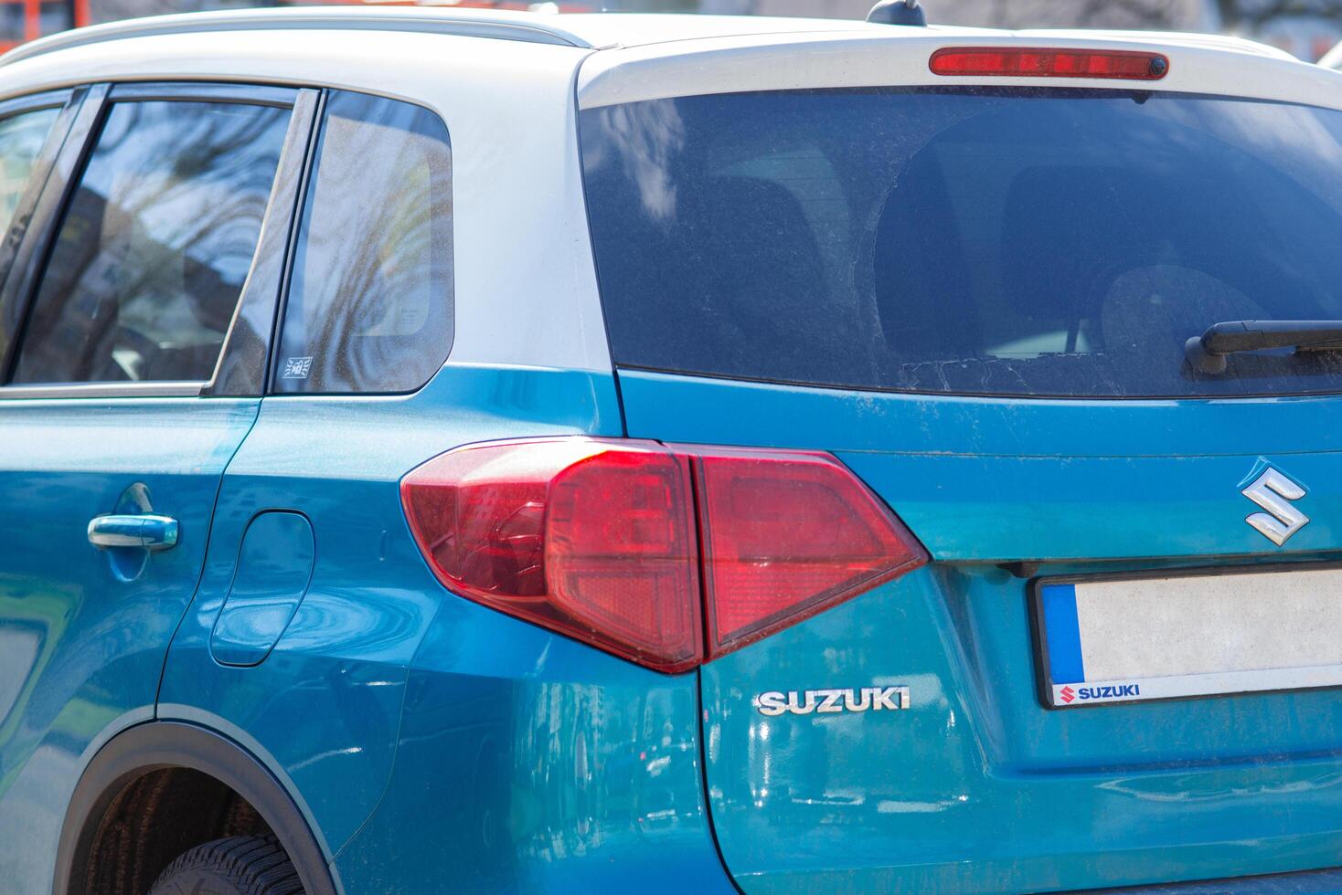 Kyiv, Ukraine. April 6, 2024. Blue Suzuki Vitara, Close up of the car detailing red taillights of SUV. photo