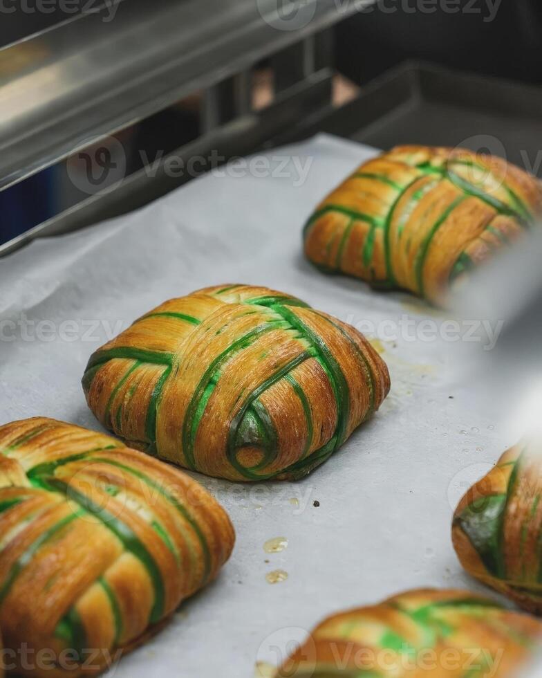 Crotupat is a pastry combination of Croissan and ketupat, an Indonesian specialty in the form of woven young coconut leaves photo