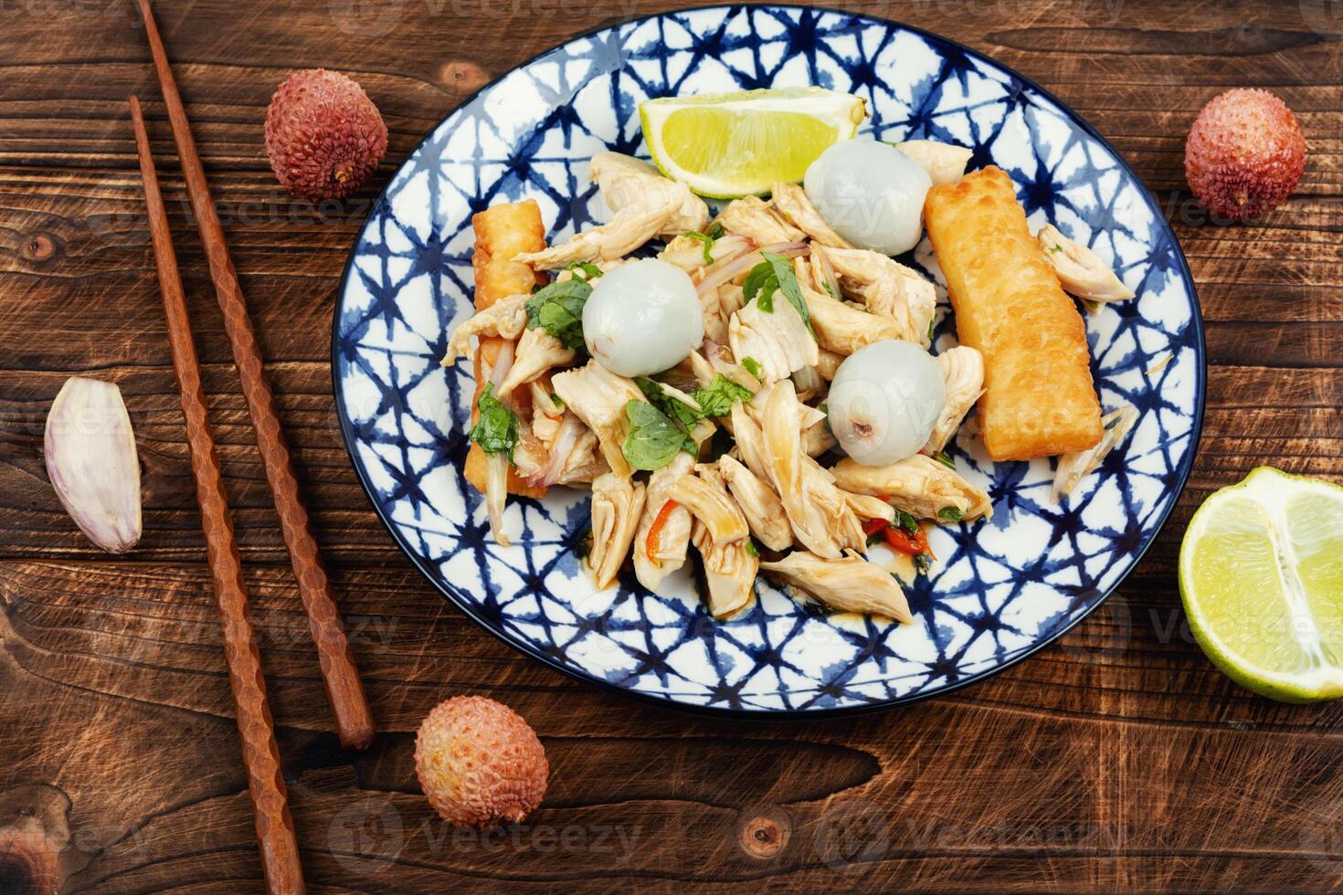 Salad with chicken fillet, lychee and lime. photo