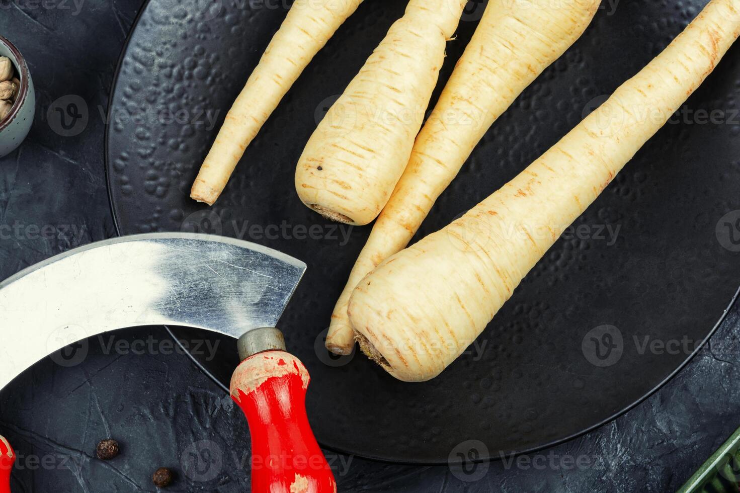 Raw parsnip roots. photo