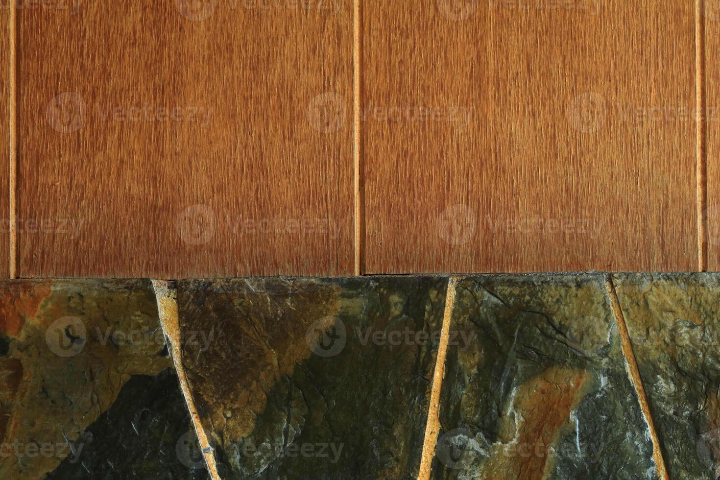 Old weathered walls with granite surfaces - wooden floors designed to blend in with intricate patterns. Shows signs of age and natural wear and tear. photo