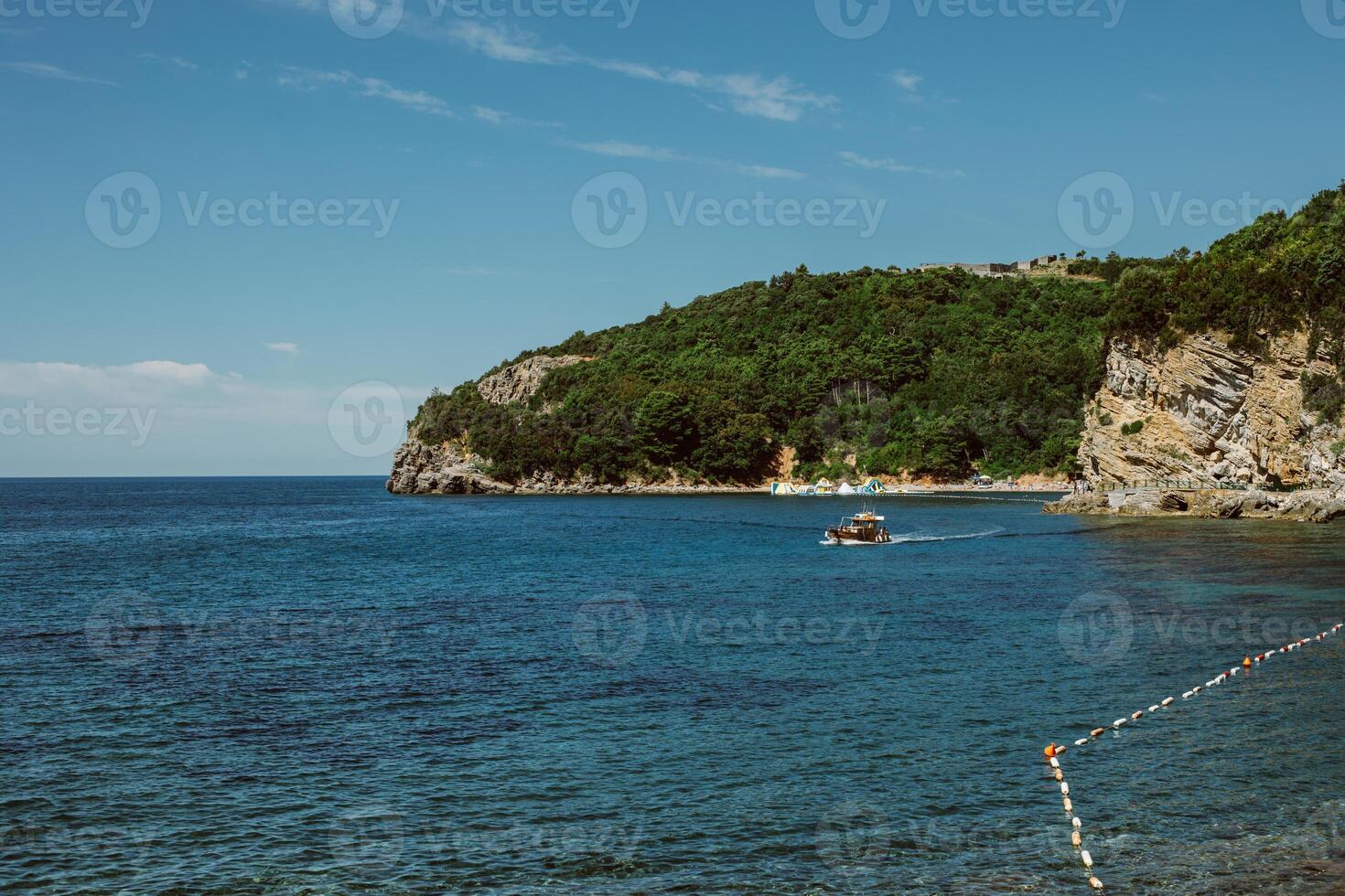 Amazing view of the Adriatic sea near Budva. Beautiful cloudy sky. photo