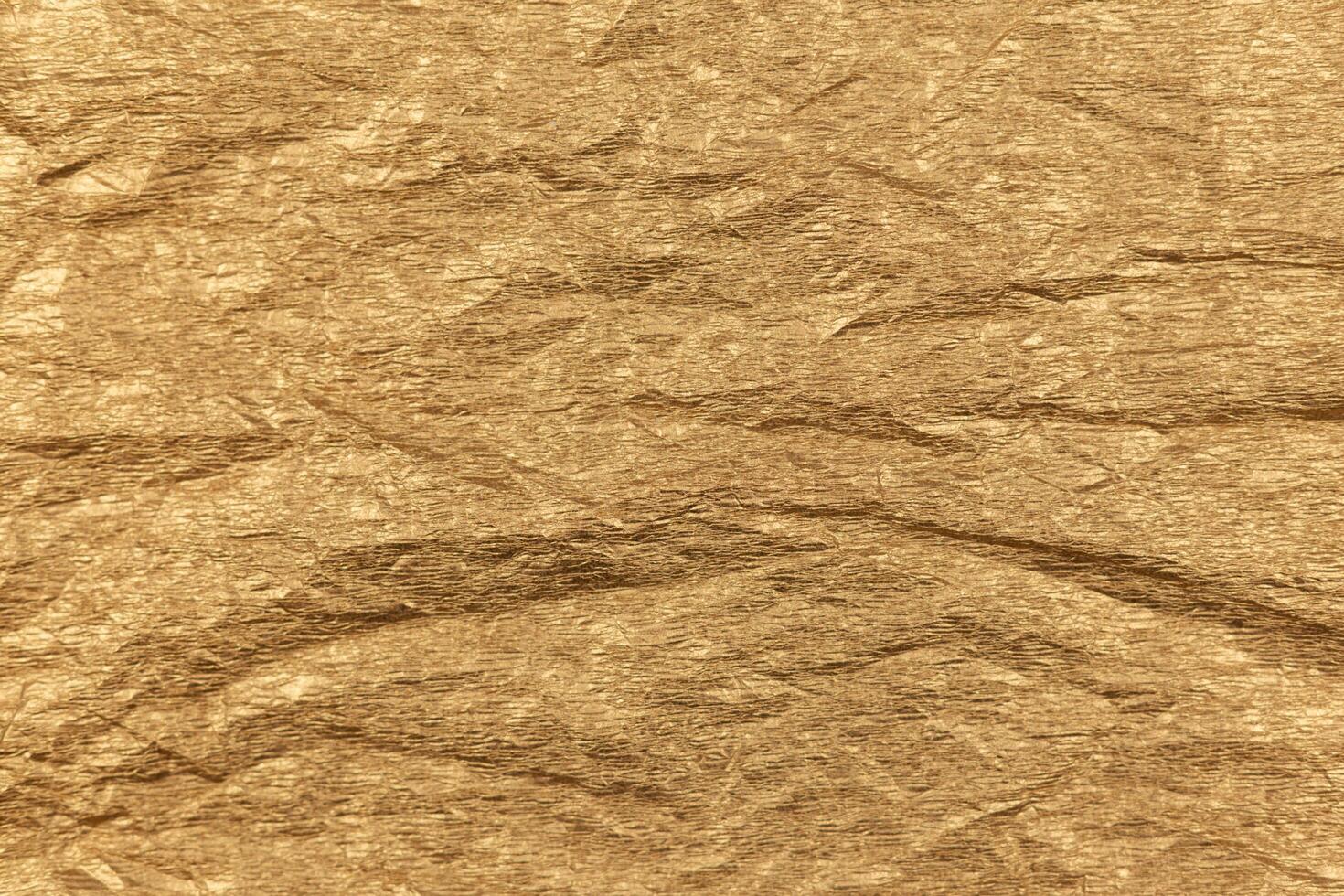 Golden paper texture or background. photo