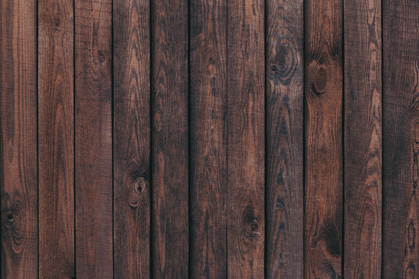 Dark brown wood texture or background. photo